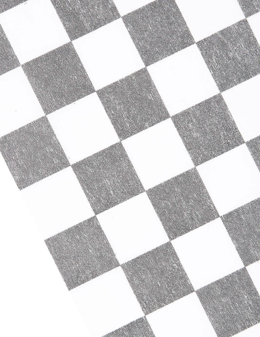 Détail du motif du chemin de table intissé damier