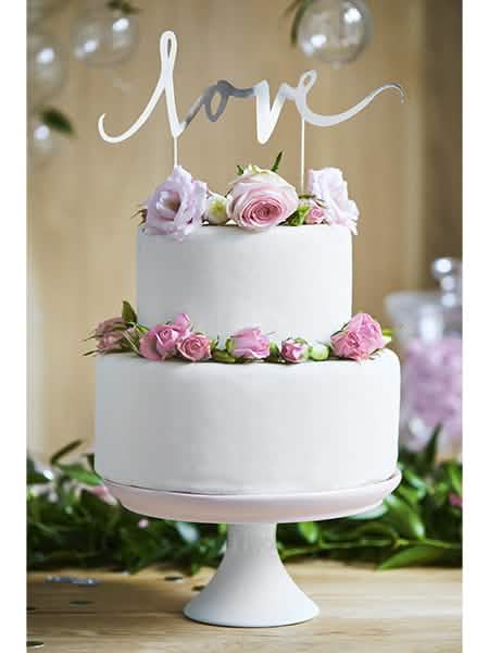 Mise en situation sur un gâteau de la décoration pic pour gâteau love