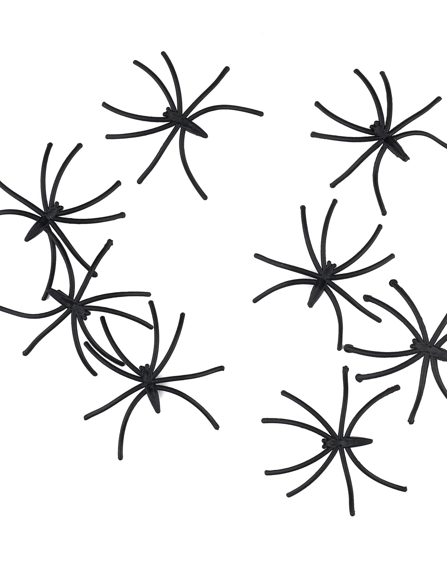 Gros plan sur plusieurs mini araignées décoratives Halloween