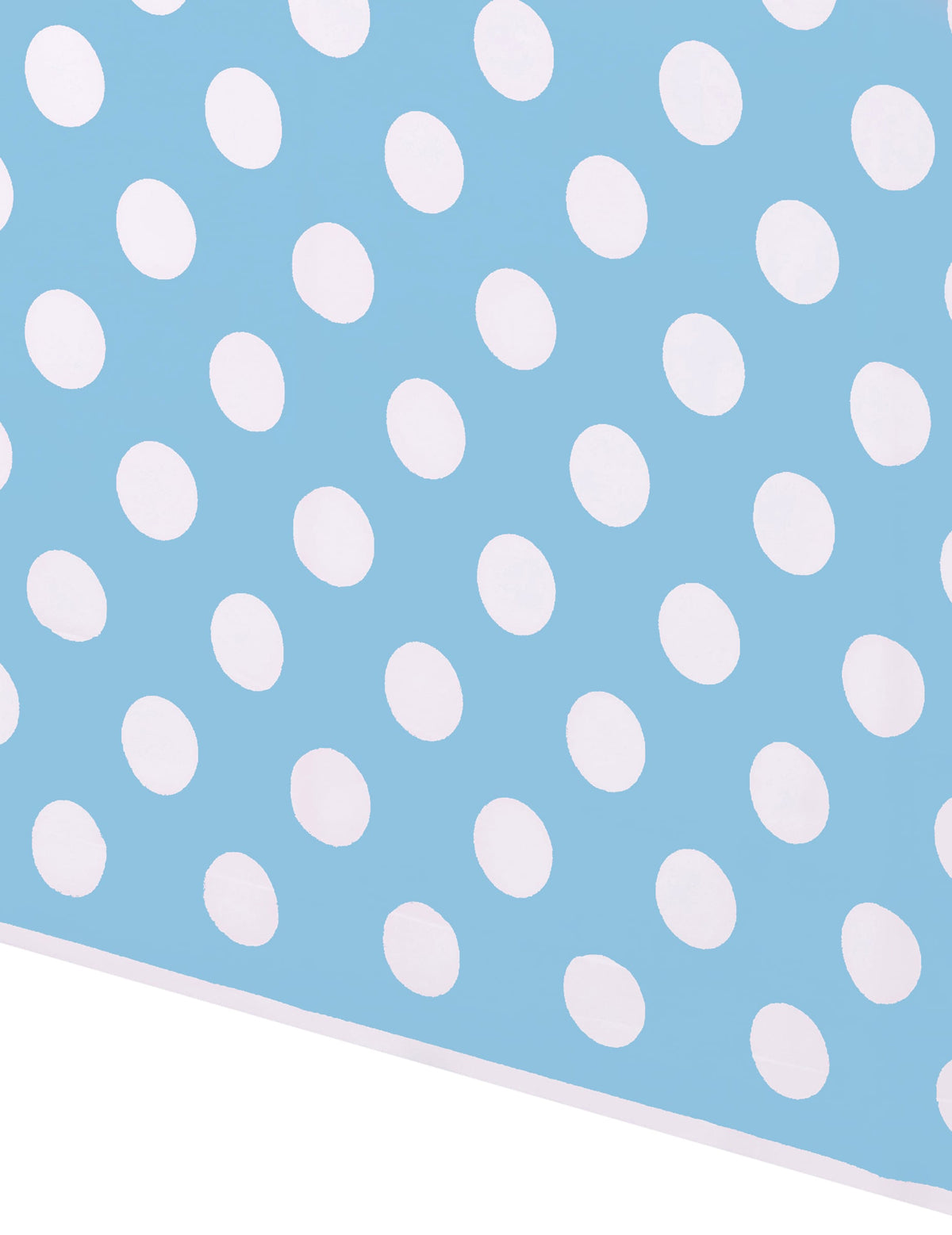 Gros plan sur le motif à pois de la nappe à pois pour fête bleue et blanche en plastique