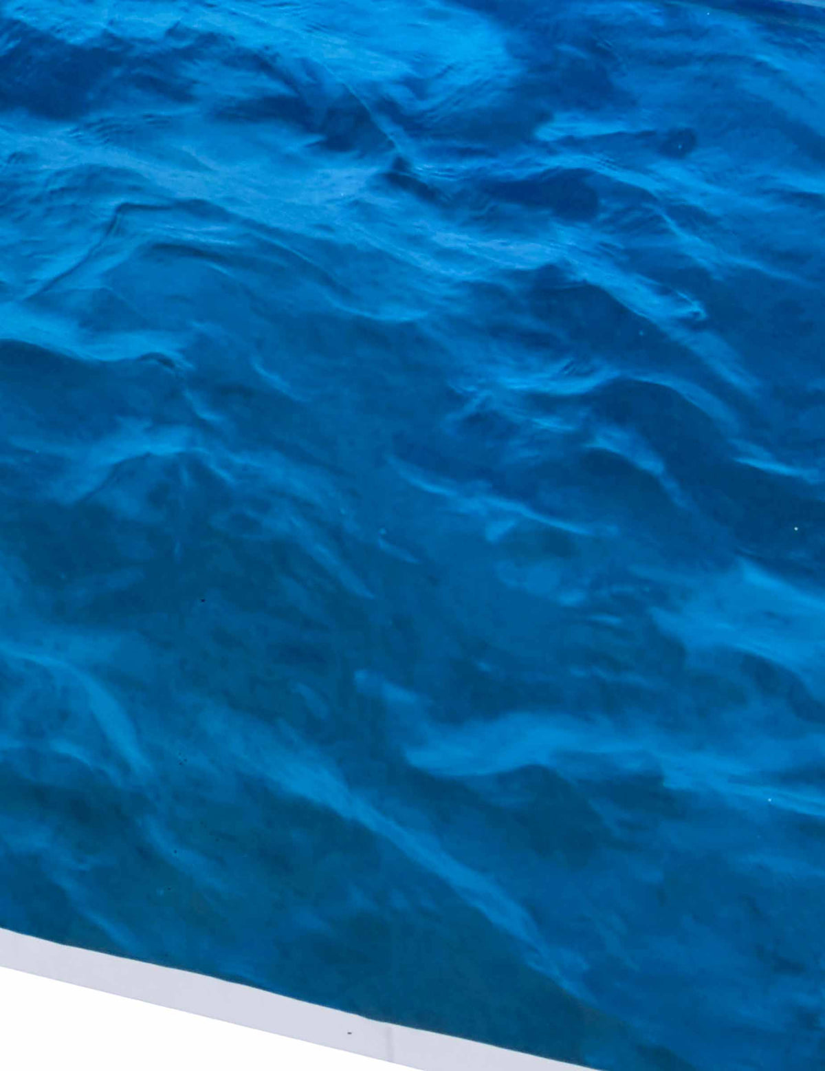 Detalji motiva plastičnog stolnjaka s valovima oceana