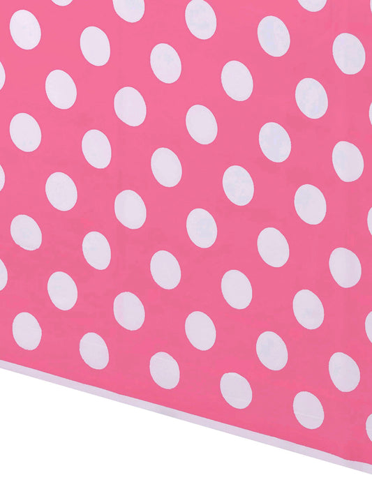 Détail du motif de la nappe plastique à pois rose et blanc