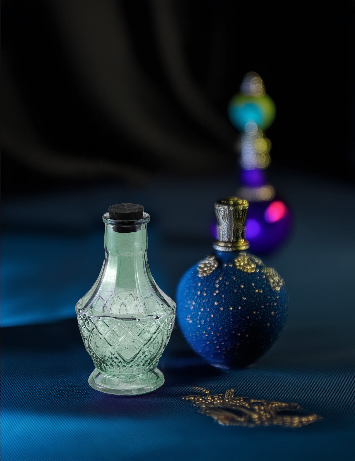 Mala 11,5 cm zelena staklena bočica