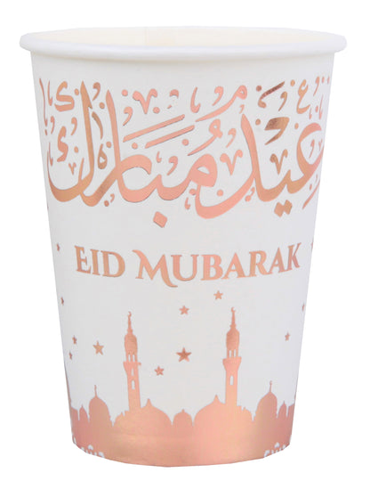 Mise en situation sur une table de fête du gobelet en carton Eid Mubarak pour l'aïd rose gold