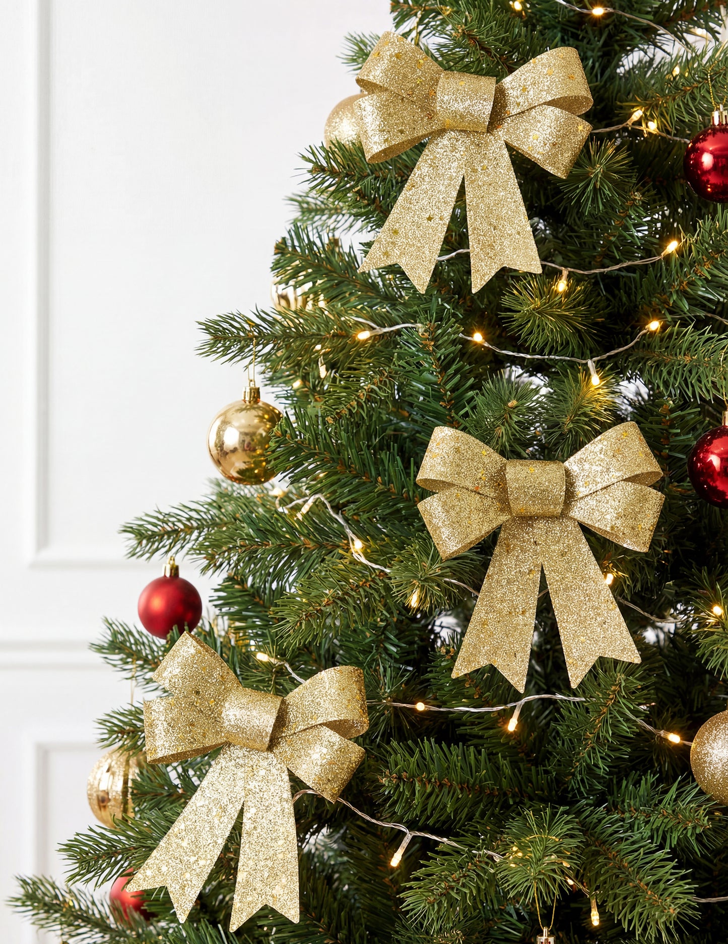 3 zlatne mašne sa šljokicama 10 x 13 cm 