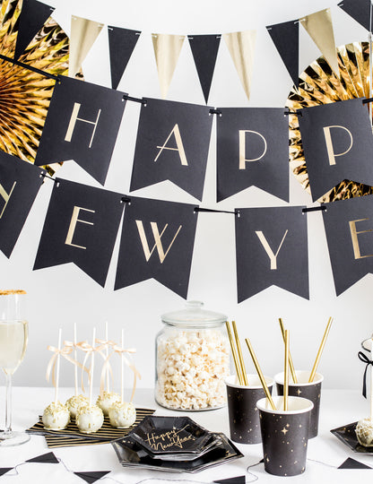 6 assiettes en carton noires et étoiles dorées 20 cm hexagonales