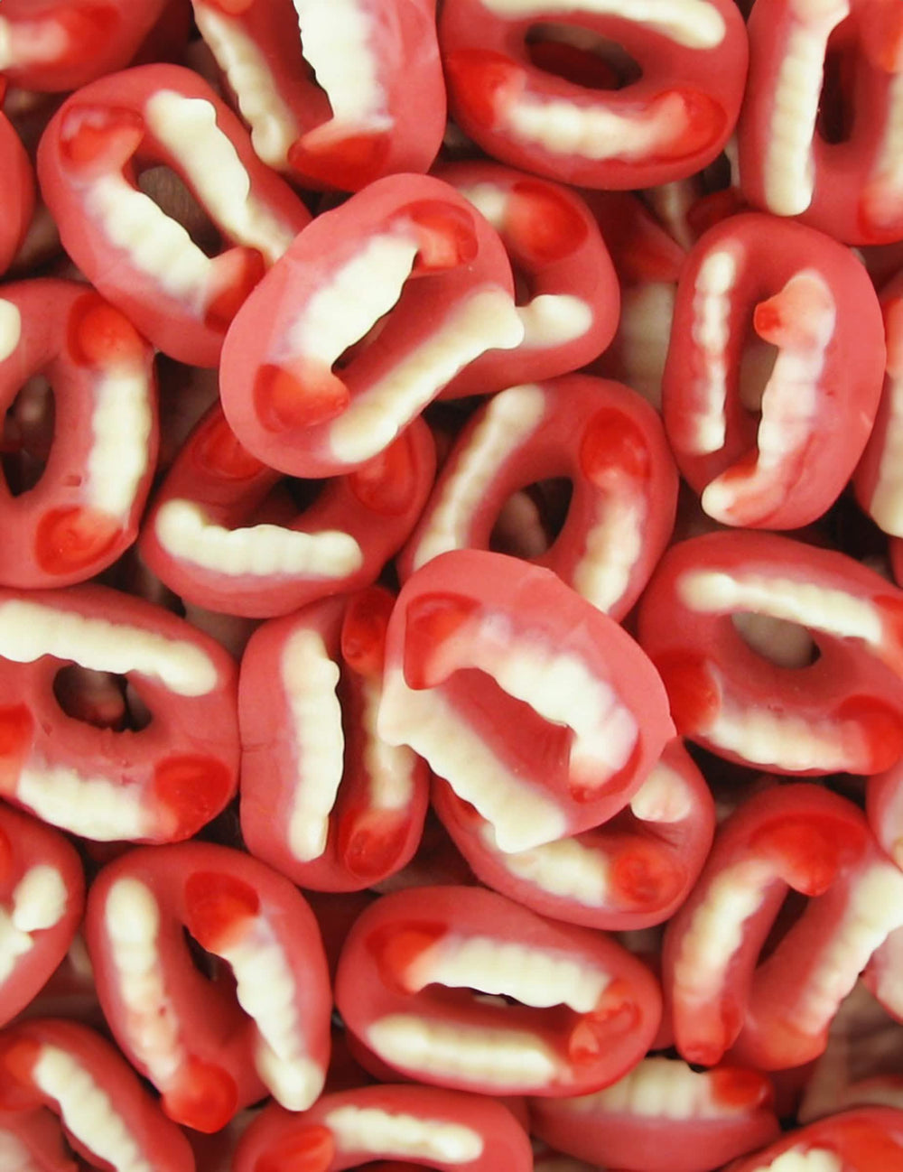 Bomboni umjetni zubi vampira za halloween crveni i bijeli
