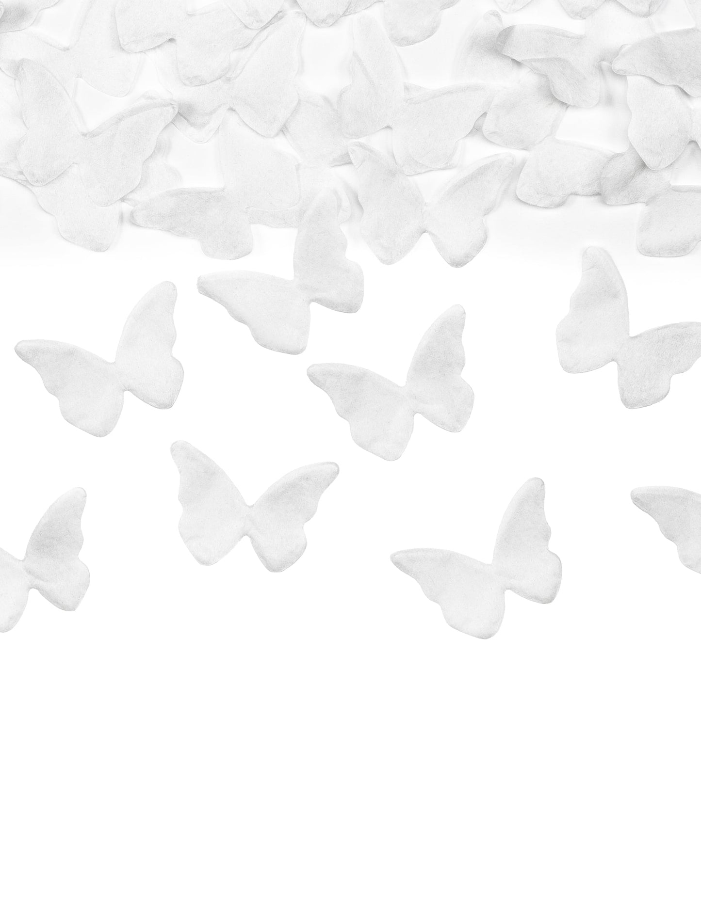 Gros plan sur les confettis papillons blancs du canon à confettis papillons pour fête