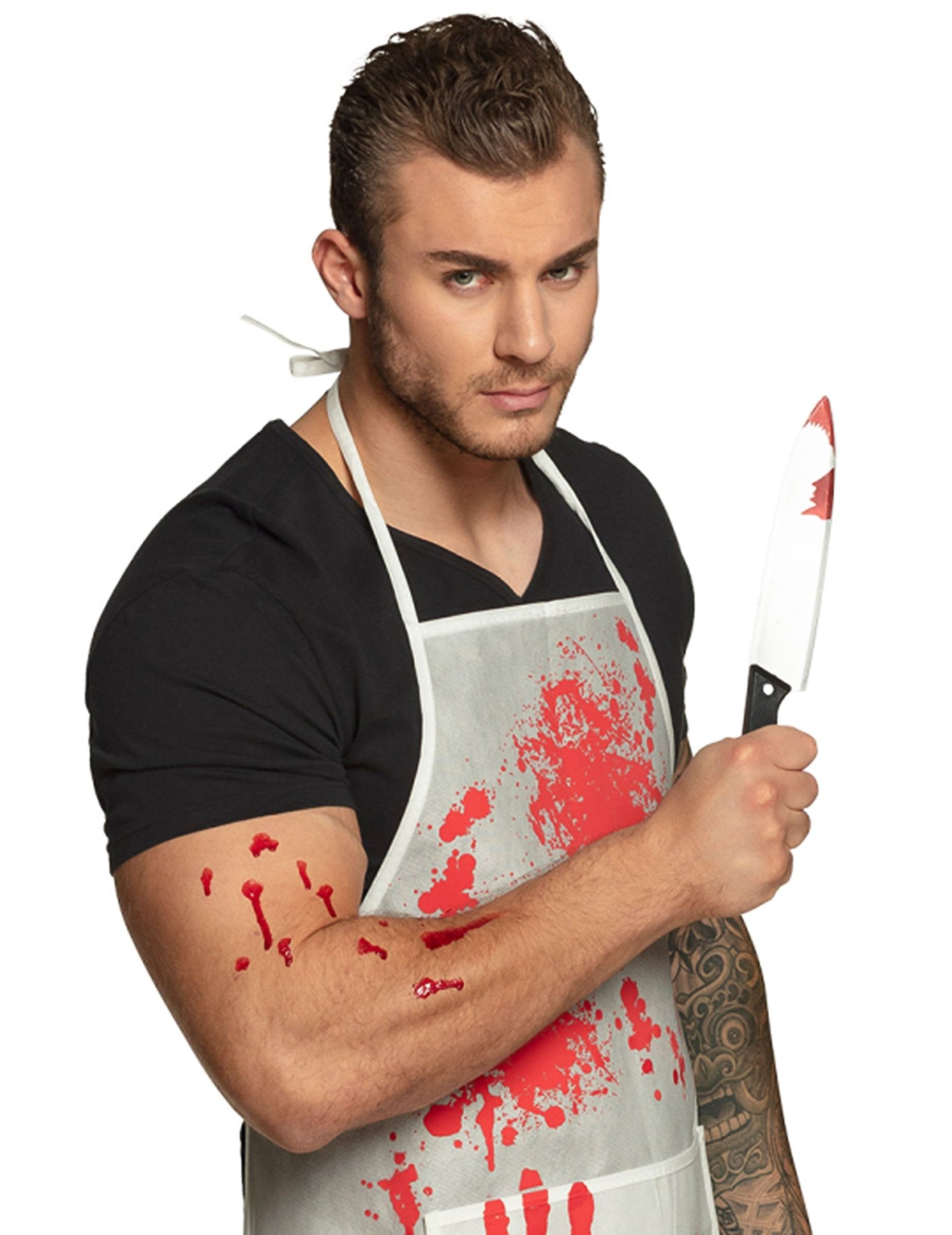 Nož u ruci plastičnog noža za Halloween u krvi