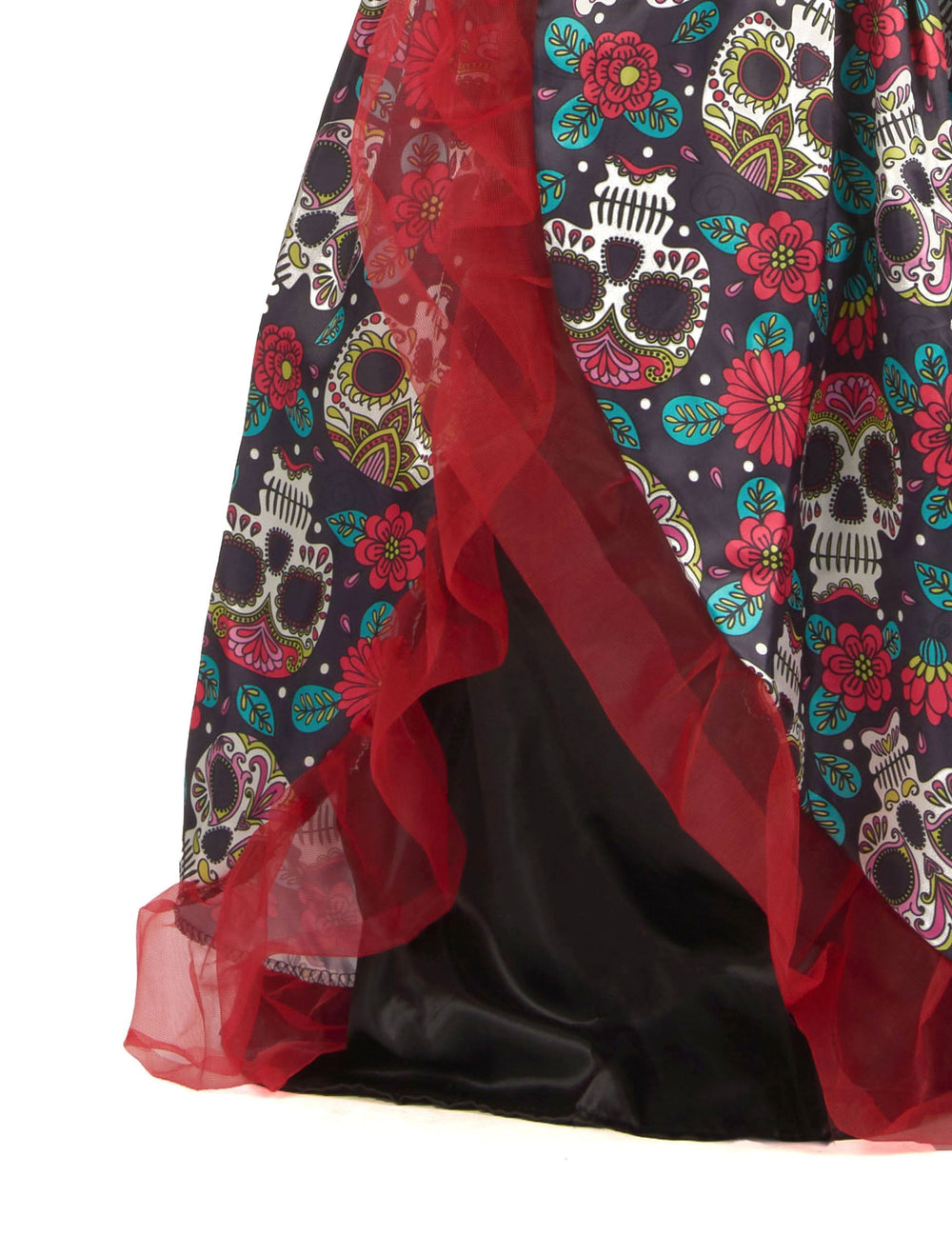 Détail du bas de la jupe et des volants rouges du déguisement Dia de los muertos fleuri