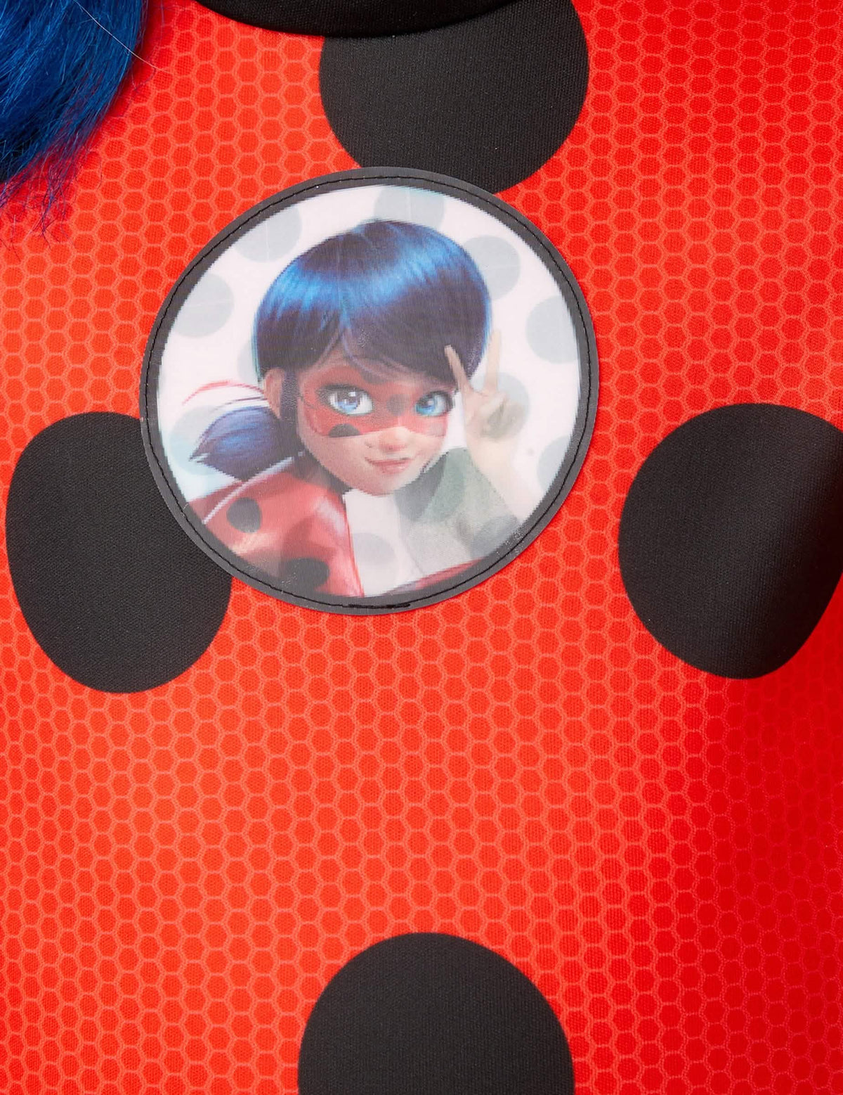 Detalj grba kostima i maske Miraculous Ladybug