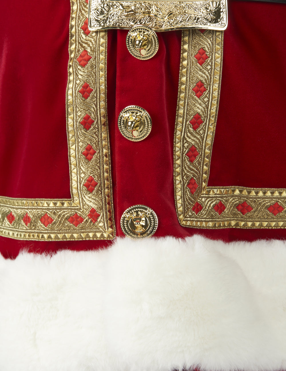 Détail des boutons dorés et des broderies du déguisement de Père Noël