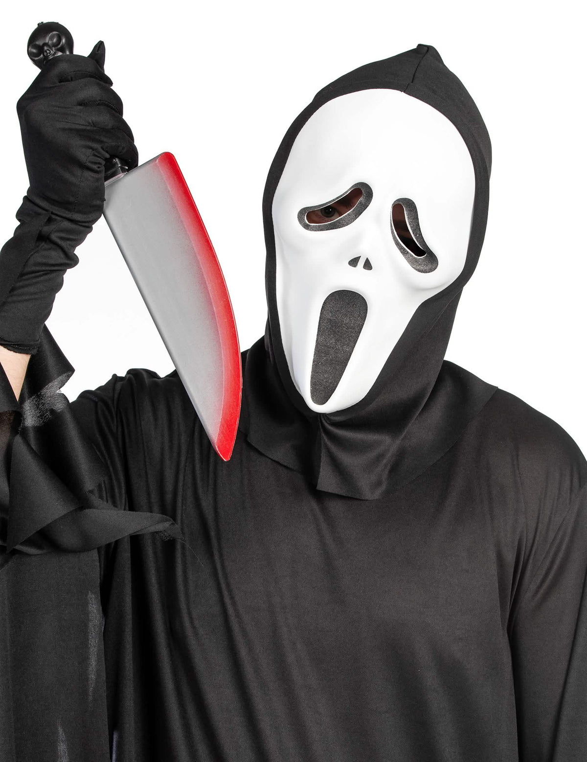 Gros plan sur le masque et le couteau du déguisement de tueur de film d'horreur pour adulte
