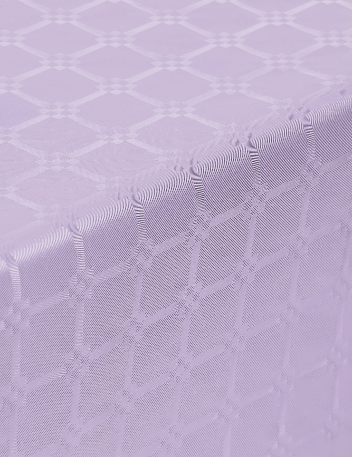 Détail du motif de la nappe en rouleau papier damassé lilas épais