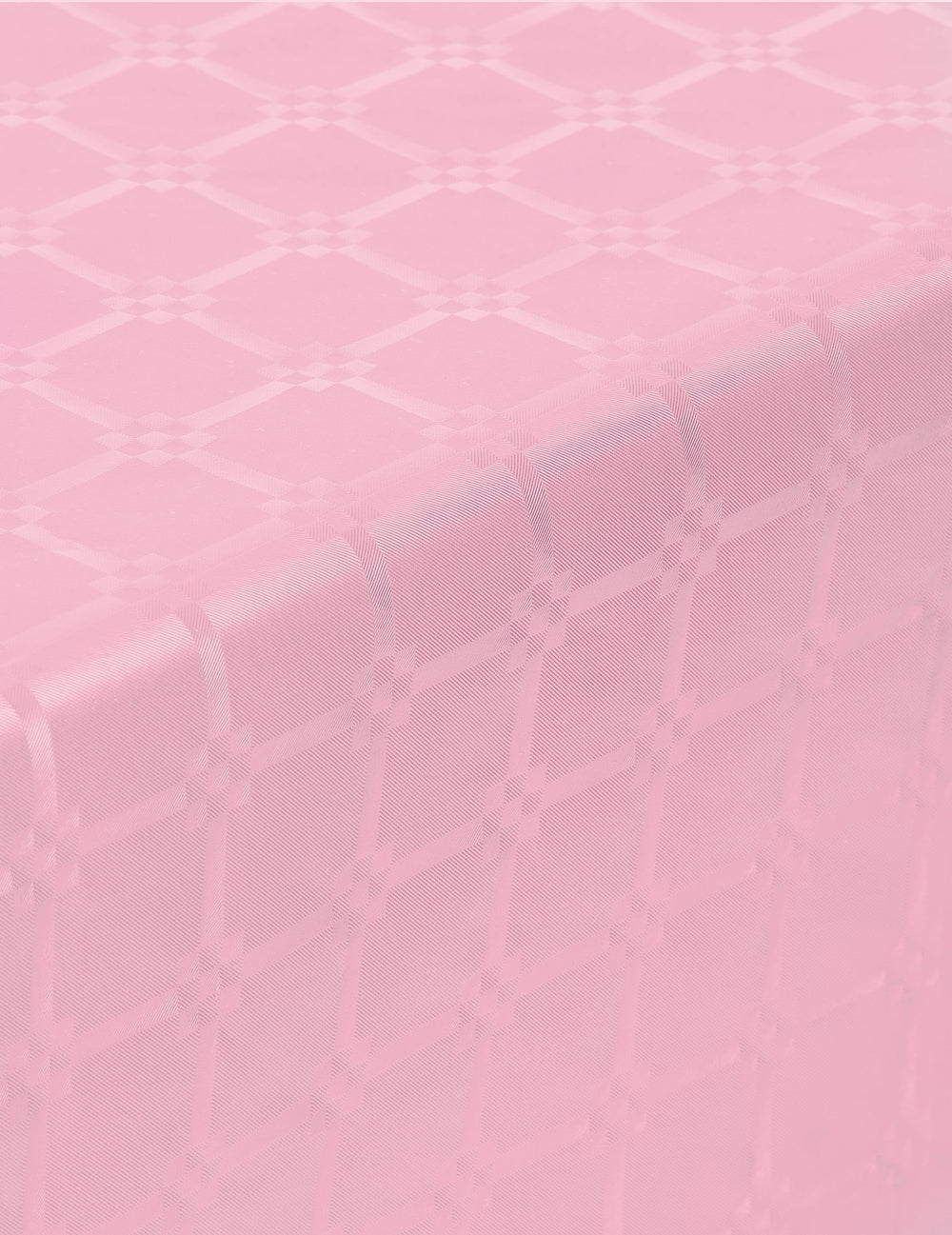 Détail des motifs de la nappe en rouleau papier damassé rose pastel