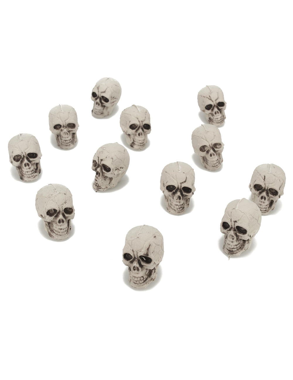 12 petites têtes de mort pour décoration en plastique blanc cassé