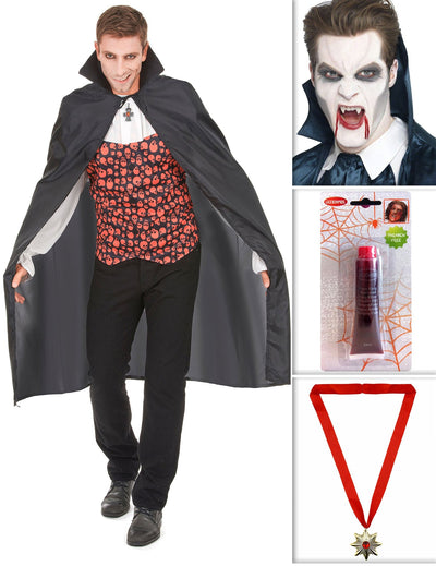 Pakiranje vampira s plaštem, zubima, lažnom krvlju i Halloween medaljonom