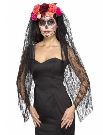 Jedrenje s šarenim cvjetovima luksuzna žena Dia de los muertos